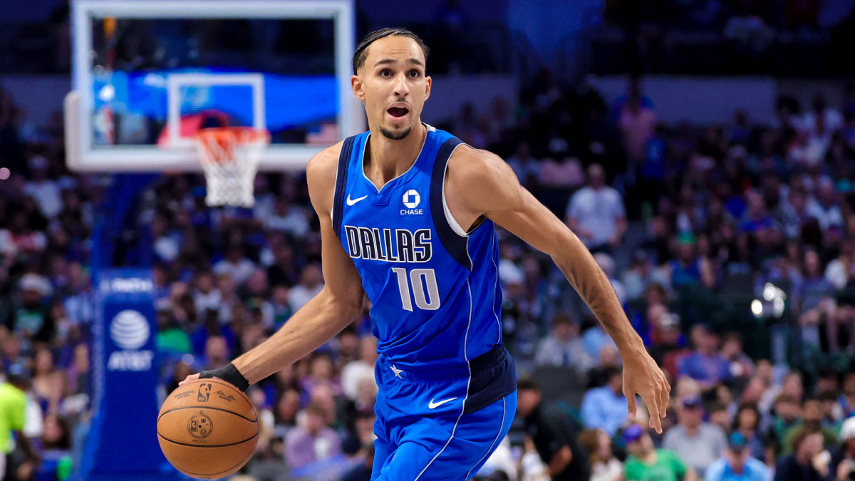 Dallas Mavericks forward Zaccharie Risacher (10) dribbles during the third quarter against the San Antonio Spurs at American Airlines Center.