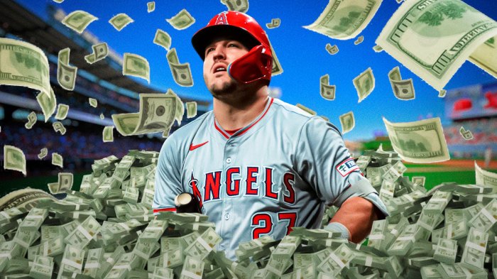 Mike Trout surrounded by piles of cash.