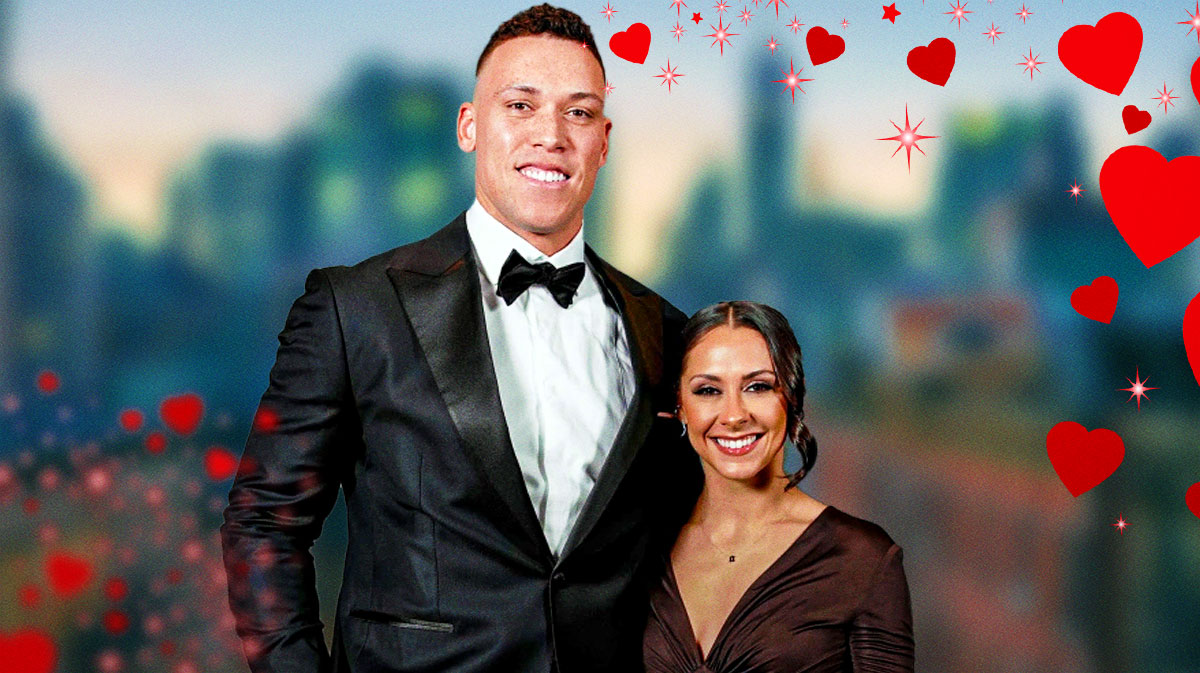 Aaron Judge and Samantha Bracksieck surrounded by hearts.