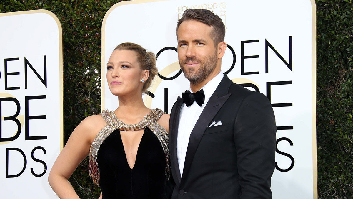 Blake Lively, left and Ryan Reynolds arrive for the 74th Golden Globe Awards at the Beverly Hilton.