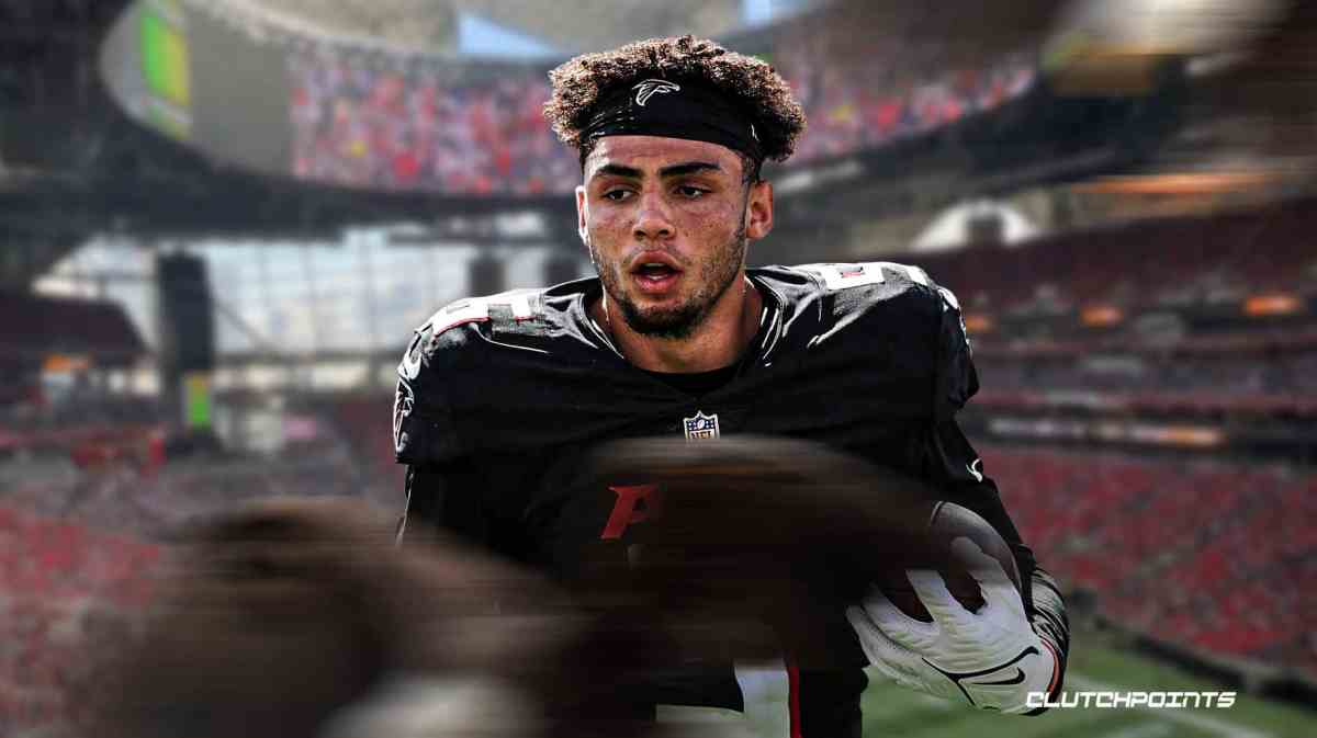 Falcons Drake London with stadium behind him