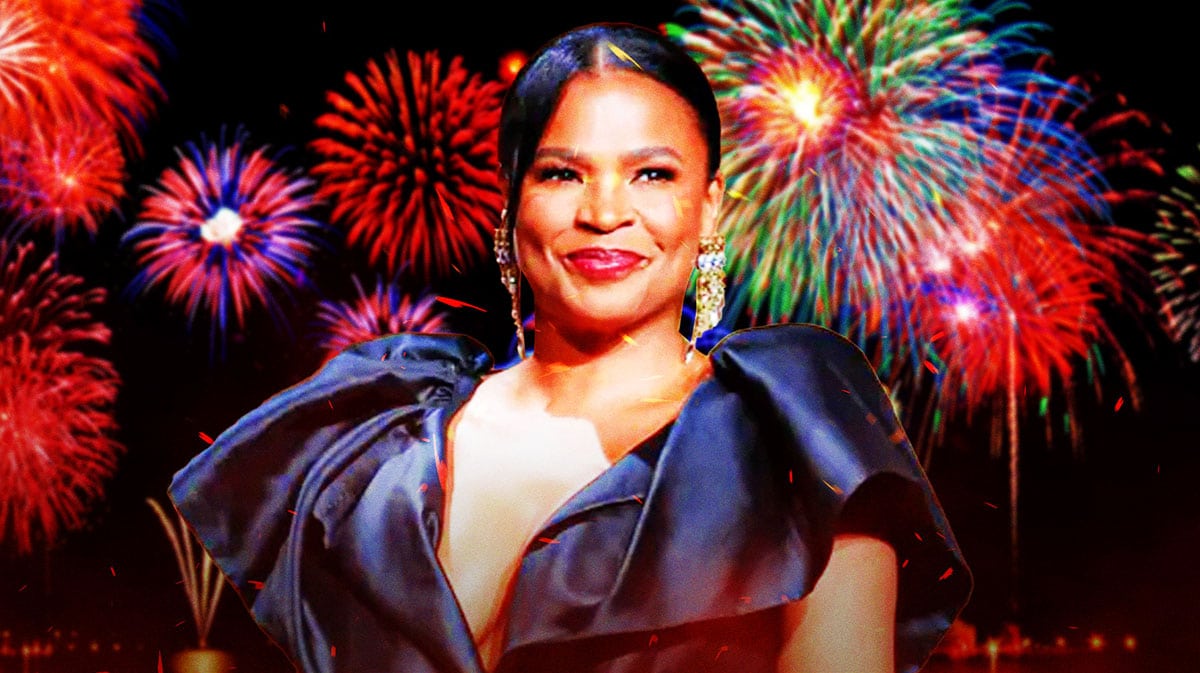 Nia Long with fireworks.