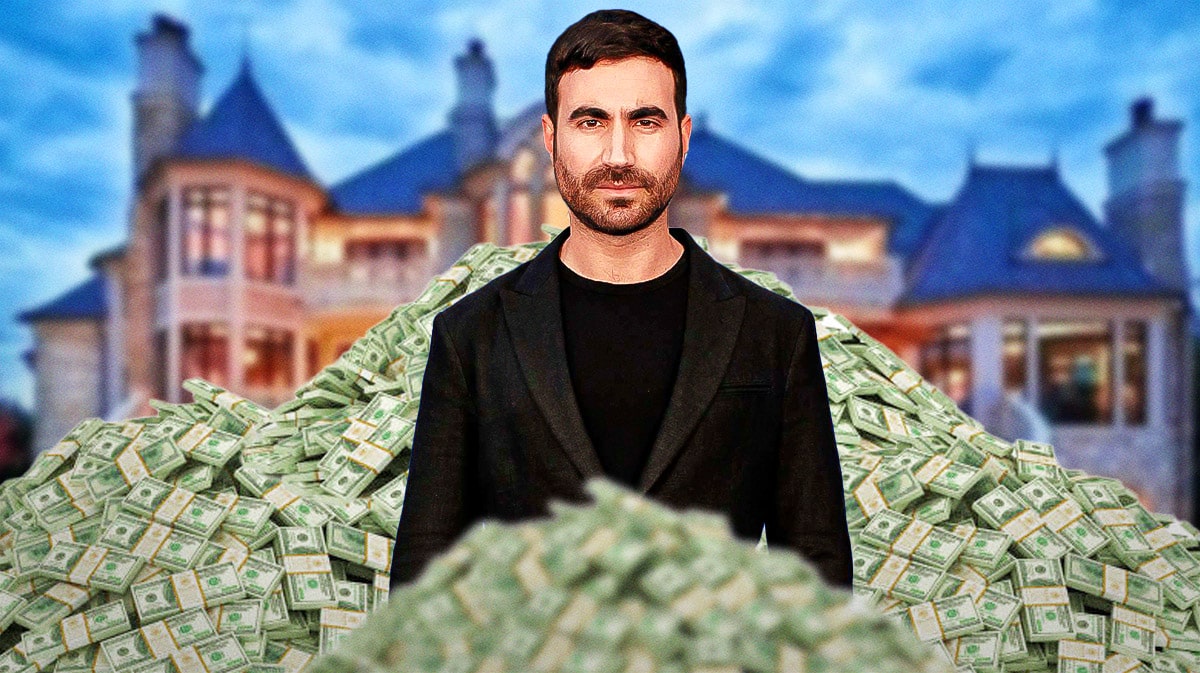 Brett Goldstein surrounded by piles of cash.