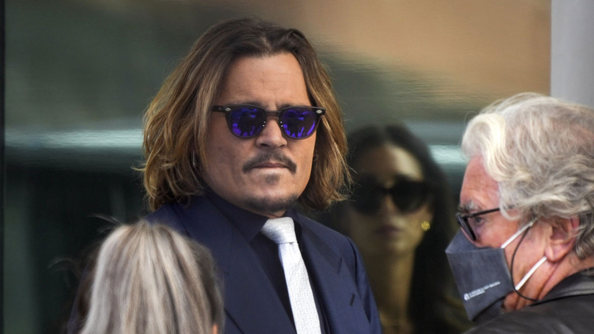 Johnny Depp arrives at the Fairfax County Courthouse for the Johnny Depp, II v. Amber Heard Civil Trial. Depp is suing Heard for $50 million, alleging she defamed him in an opinion column she published in the Washington Post, which is printed in Fairfax County, in December 2018. In the column, she claimed to be a victim of domestic abuse, a claim she first raised during their corrosive divorce proceeding in 2016 in Los Angeles.