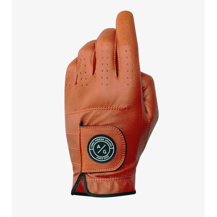 Rust colored Asher golf rust golf glove on a white background.