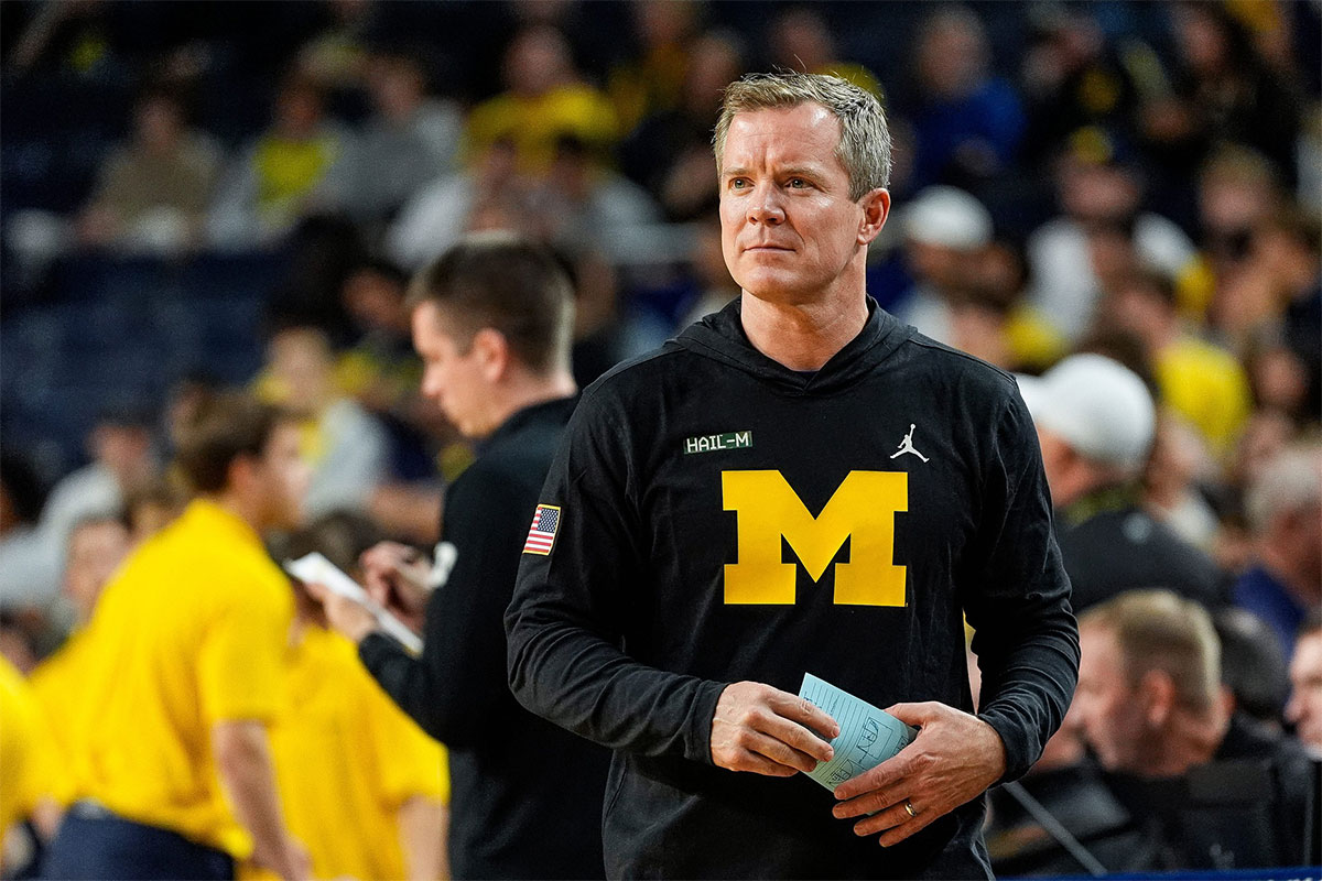 Michigan head coach Dusty May watches warm up before the season opener against Cleveland State during the first half at Crisler Center in Ann Arbor on Monday, Nov. 4, 2024.
