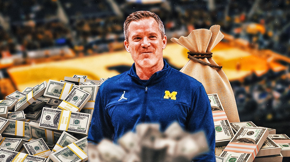 Dusty May surrounded by piles of cash.