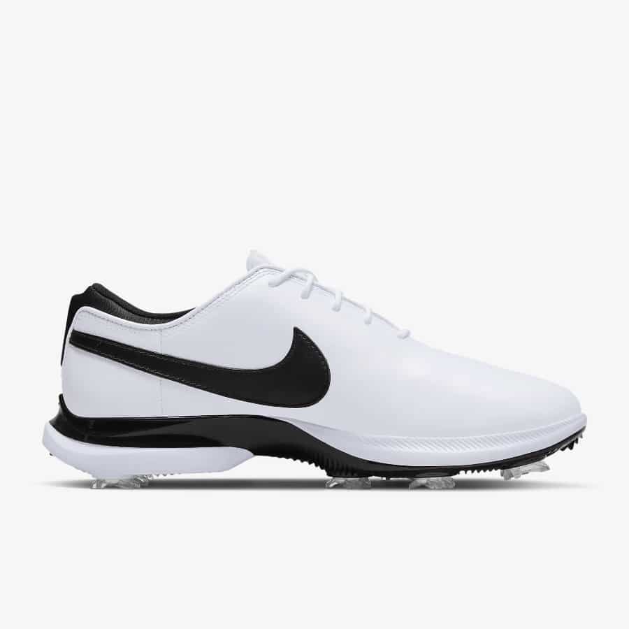 Black swoosh logo on a white shoes, the Nike Air Zoom Victory Tour 2 Golf Shoes on a white background.