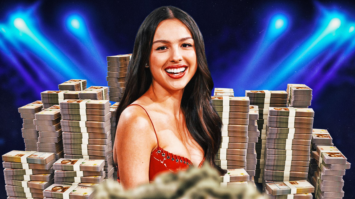 Olivia Rodrigo surrounded by piles of cash.