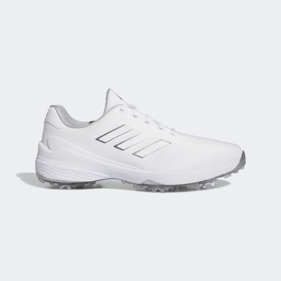 Adidas ZG23 golf shoes - Cloud white metallic colorway on a white background.