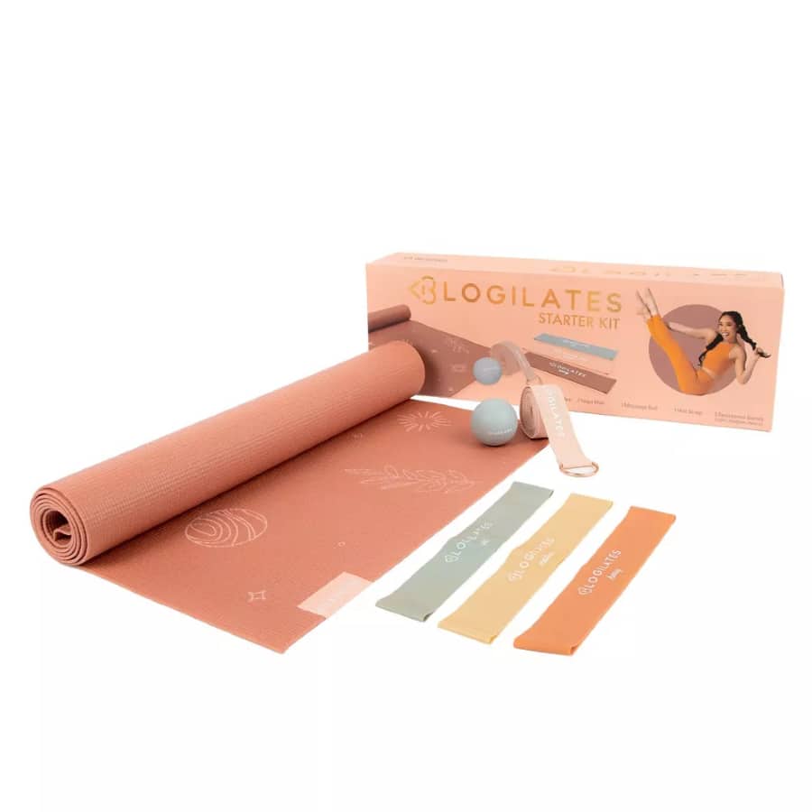 Blogilates Starter Fit Kit with mat and bands on a grey background. 
