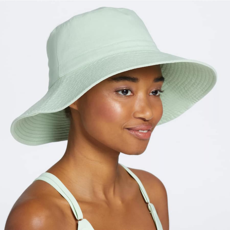 CALIA Women's Wide Brim Bucket Hat in a light green colorway on a light grey background. 