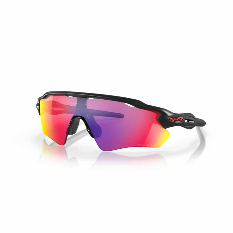 Pair of Oakley Radar EV Path - Matte black sunglasses on a gray background.