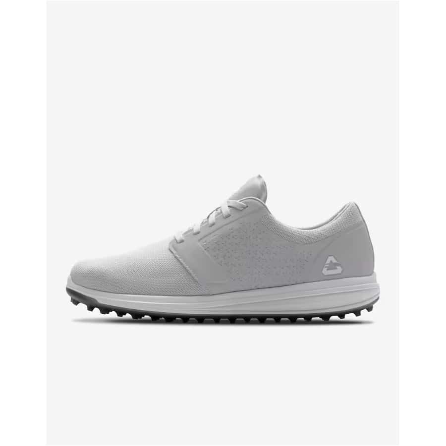 Travis Mathew The Moneymaker spikeless golf shoe - Heather microchip colorway on a grey background.