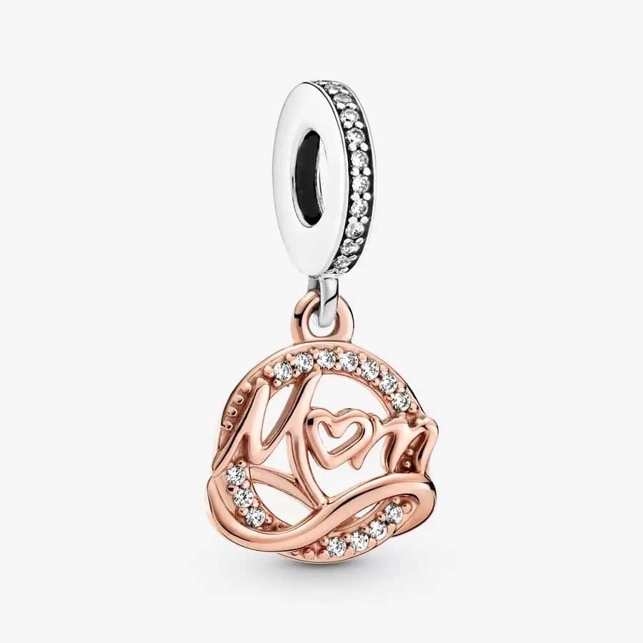 Two-tone Mom Dangle Charm from Pandora on a grey background.