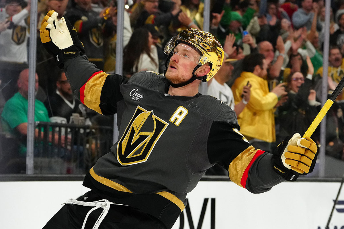 Vegas Golden Knights center Jack Eichel (9) celebrates after scoring a goal against the New Jersey Devils during the third period at T-Mobile Arena.