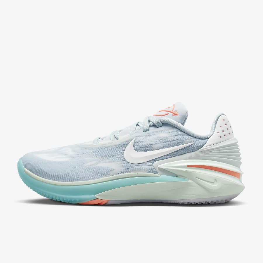Nike G.T. Cut 2 basketball shoes - Aura/Barely green/Vivid sky/Sail colorway on a light gray background.