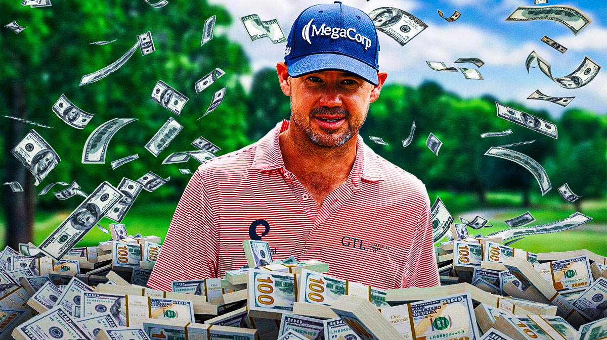 Brian Harman surrounded by piles of cash.