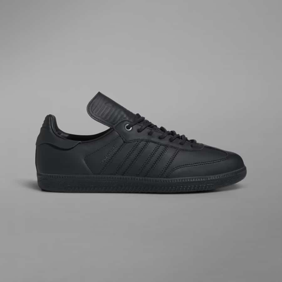 Adidas Humanrace x Samba Shoes - Charcoal/Charcoal/Charcoal colorway on a dark gray background. 