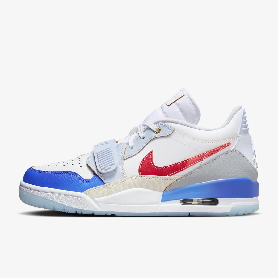 Air Jordan Legacy 312 Low - White/White/Game Royal/University Red colorway on a light gray background.