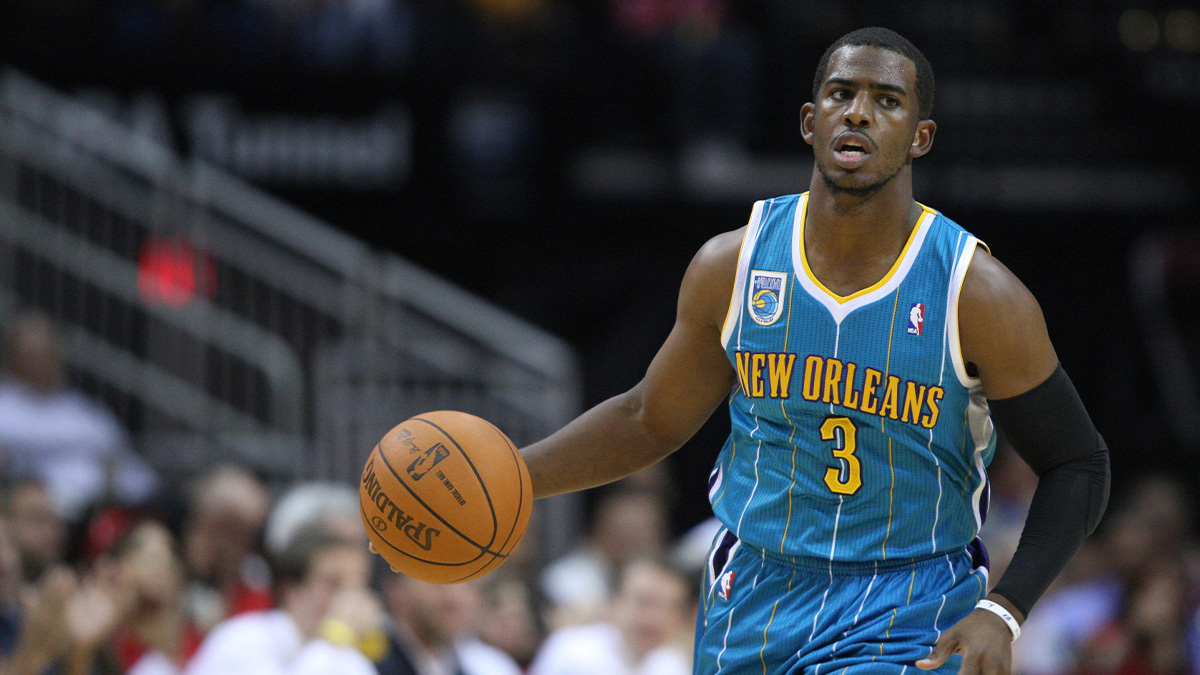 New Orleans Hornets point guard Chris Paul (3) dribbles downcourt against the Houston Rockets during the first quarter at the Toyota Center.