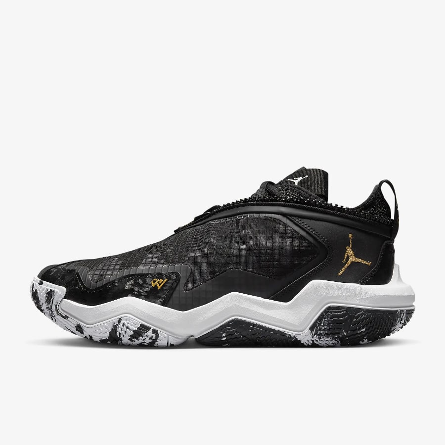 Jordan Why Not .6 - Black/White/Metallic Gold colorway on a light gray background. 