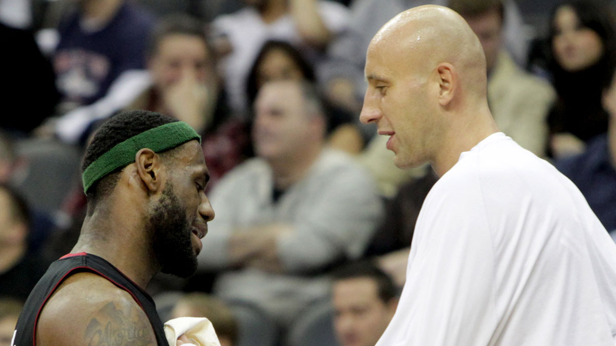 Miami Heat forward LeBron James (6) talks with center Zydrunas Ilgauskas (11) during the first half against New Jersey Nets at the Prudential Center.