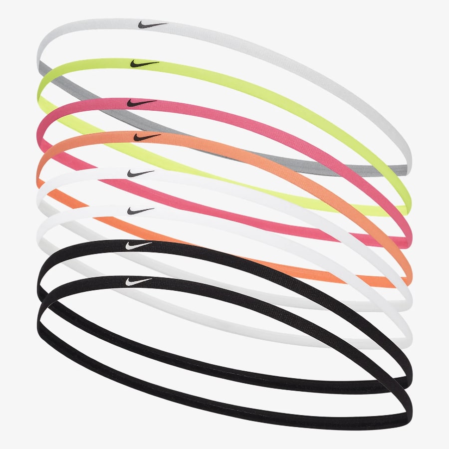 Nike Skinny Hairbands (8-Pack) - Multi-colors on a light gray background.