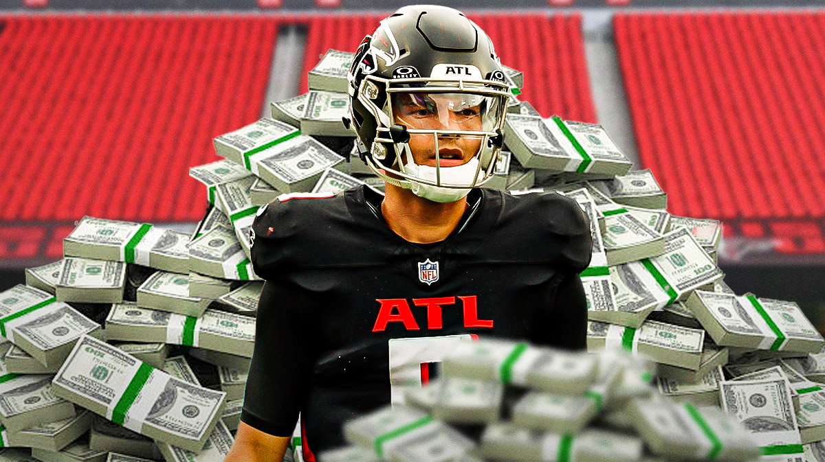 Desmond Ridder surrounded by piles of cash.