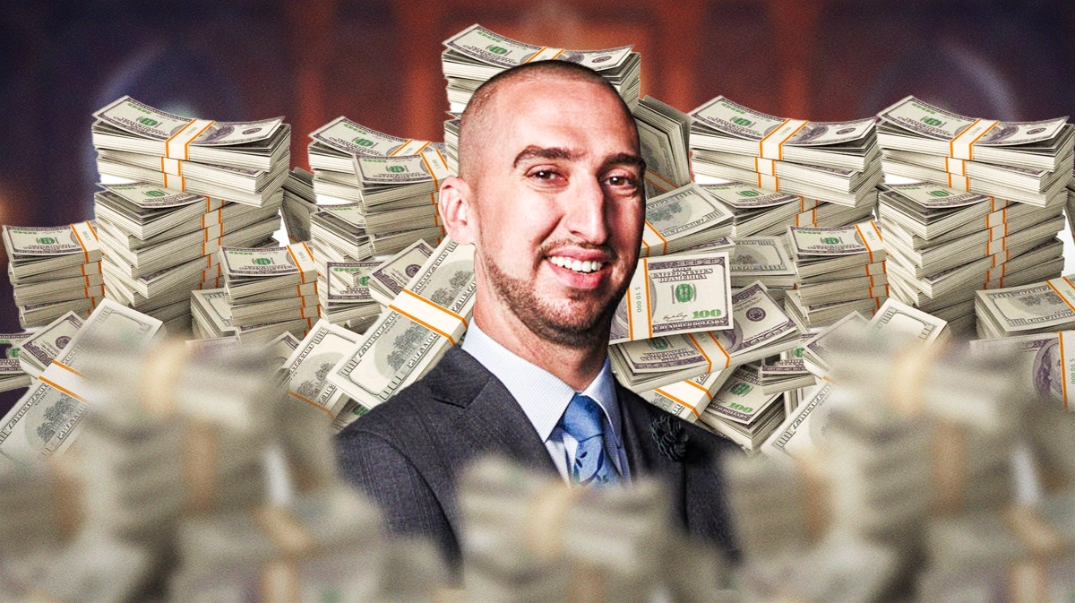 Nick Wright surrounded by piles of cash.