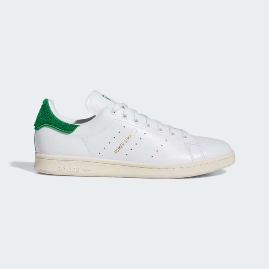 Adidas Stan Smith 'Homer Simpson' - Cloud White/Green/Cream White colorway on a light gray background. 