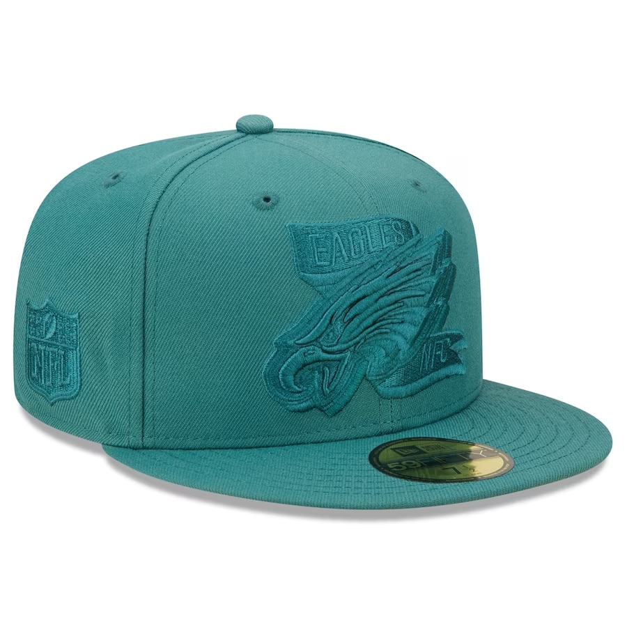 Philadelphia Eagles New Era Tonal 2022 Sideline 59FIFTY Fitted Hat - Midnight Green colored on a white background.