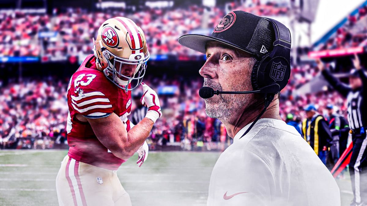Kyle Shanahan watching Christian McCaffrey flex