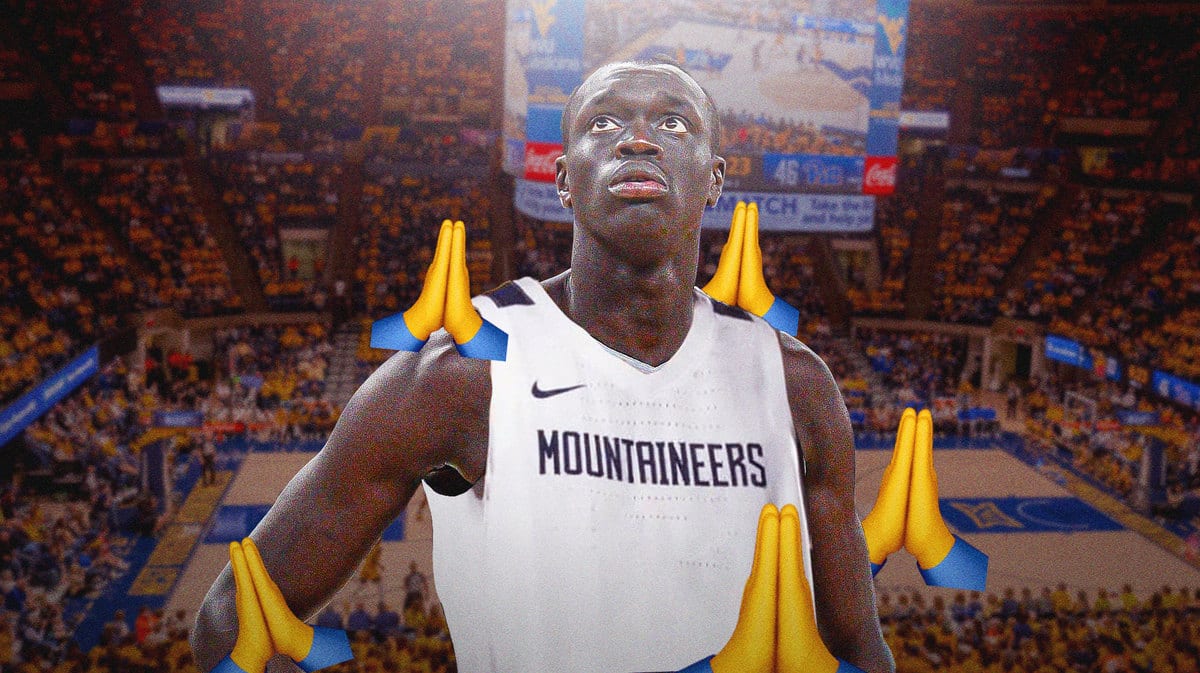 West Virginia basketball big man Akok Akok is recovering at home