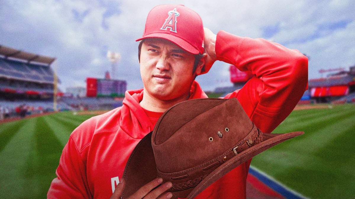 Shohei Ohtani holding a cowboy hat