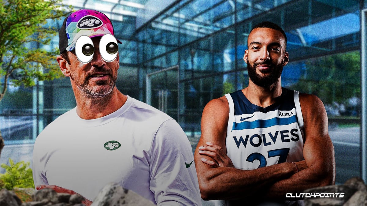 Aaron Rodgers with big emoji eyes looking at Rudy Gobert