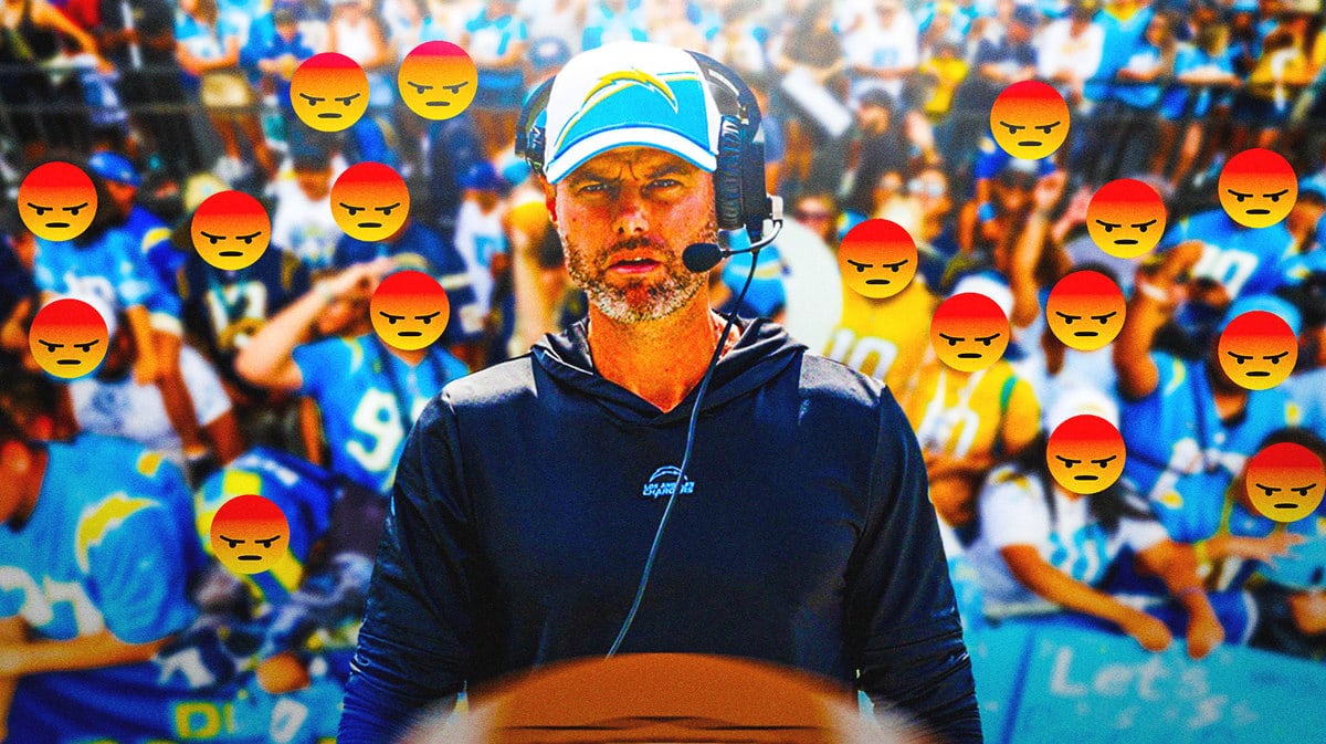 Brandon Staley with a bunch of Chargers fans who are angry that he will continue calling plays on defense