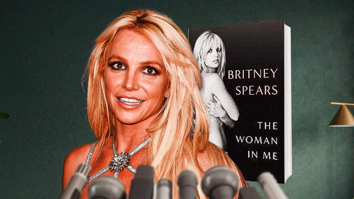 Britney Spears with her book The Woman In Me behind her