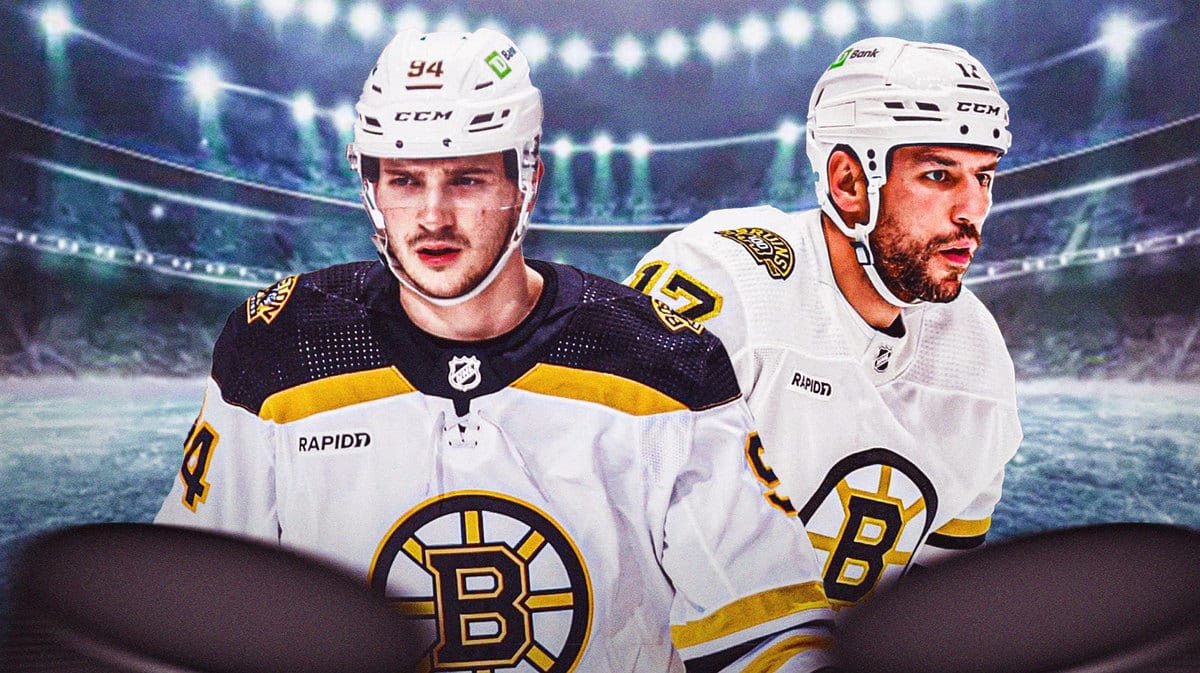 Image: Milan Lucic and Jakub Lauko in image looking stern, BOS Bruins logo, first aid kit, hockey rink in background