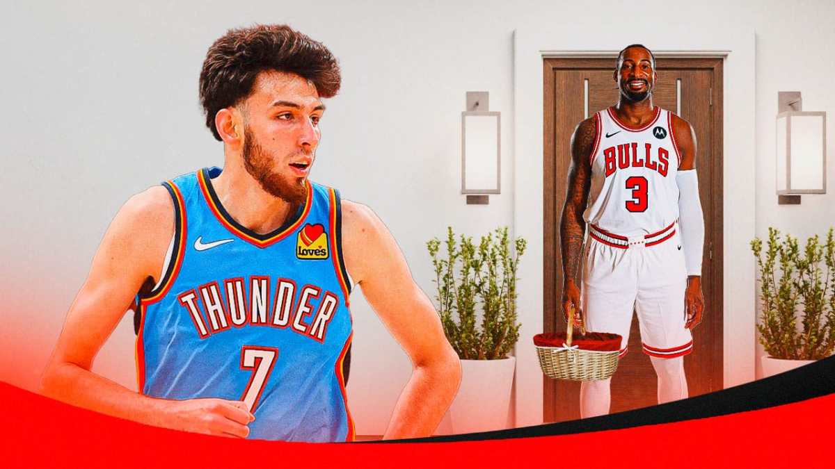 Andre Drummond giving Chet Holmgren a welcome basket