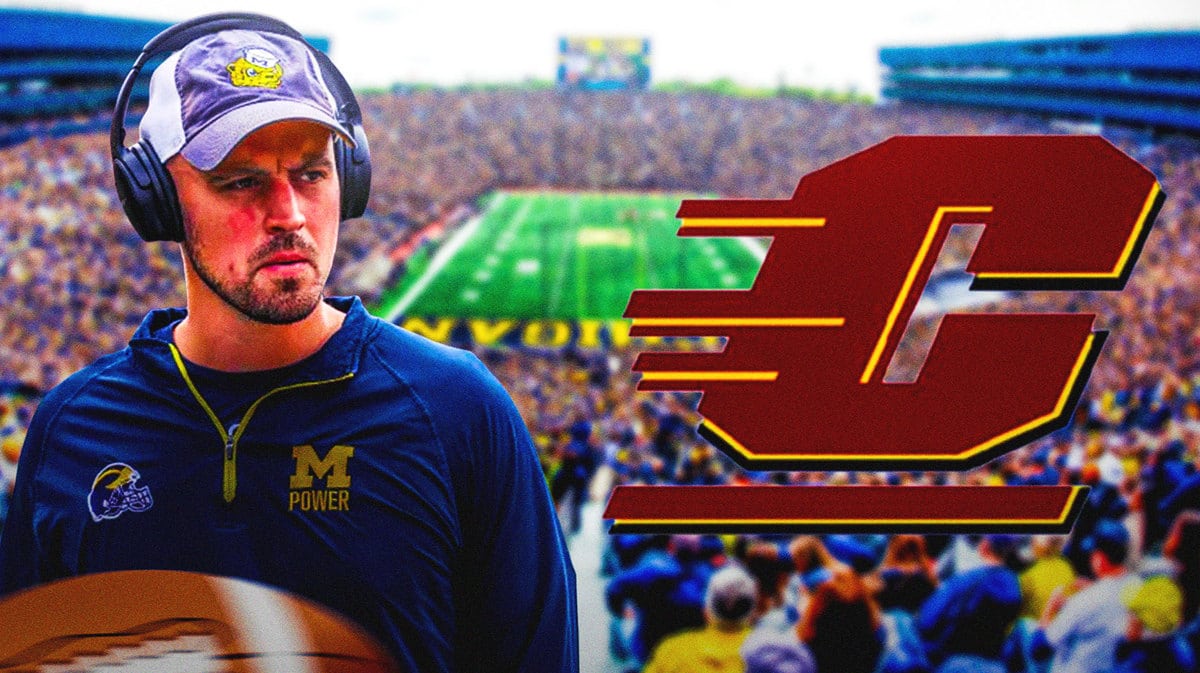 Connor Stalions with the Central Michigan logo near him.