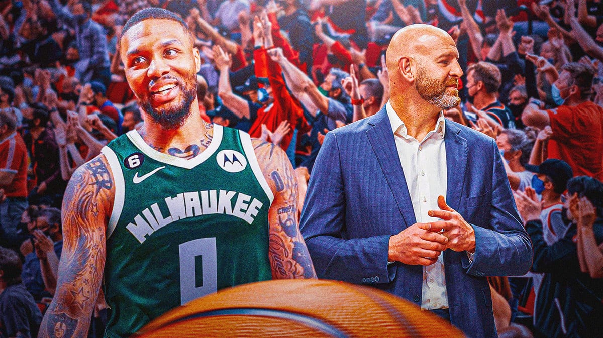 Milwaukee Bucks guard Damian Lillard and Portland Trail Blazers GM Joe Cronin in front of Blazers fans.