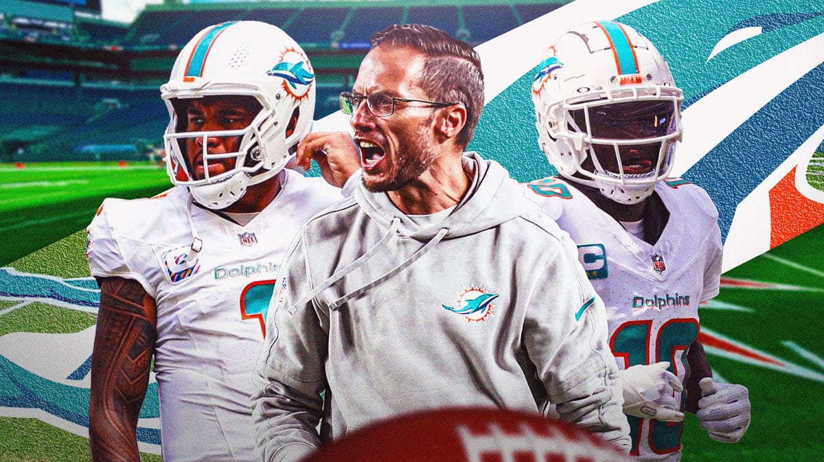 Tua Tagovailoa, Mike McDaniel and Tyreek Hill all in Miami Dolphins gear