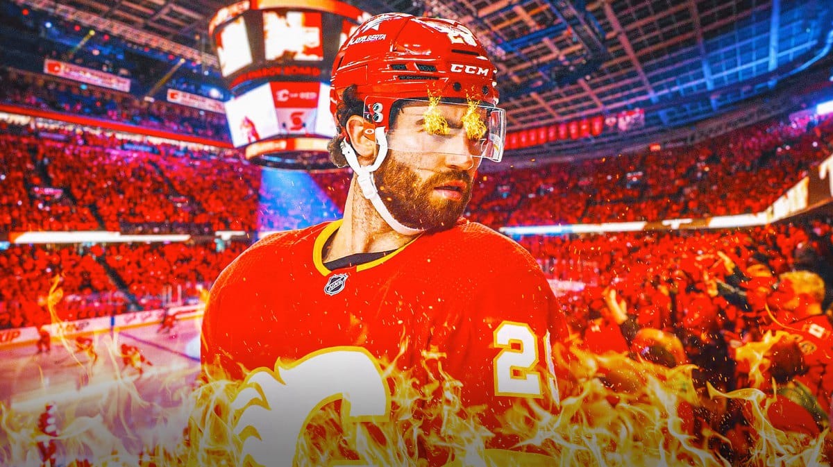 Calgary Flames breakout candidate Dillon Dube with fire in his eyes and the Scotiabank Saddledome in the background.