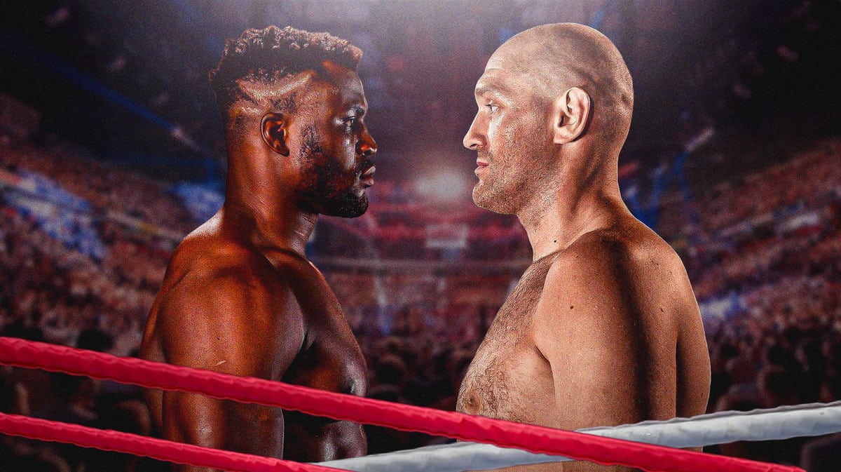 Tyson Fury and Francis Ngannou staring at each other