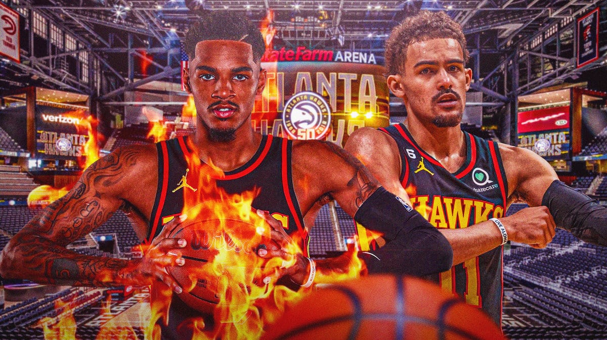 Atlanta Hawks guard Dejounte Murray celebrating in a fiery aura at State Farm Arena. Hawks guard Trae Young in the background.