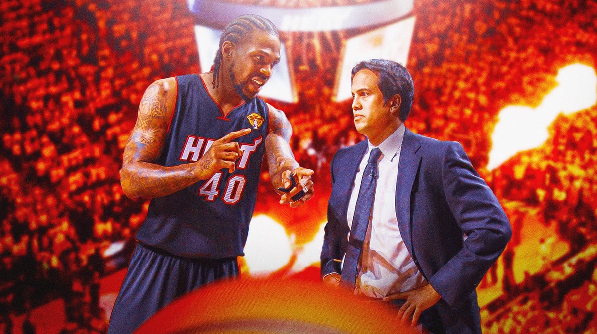 Miami Heat player Udonis Haslem and head coach Erik Spoelstra in front of the Kaseya Center.