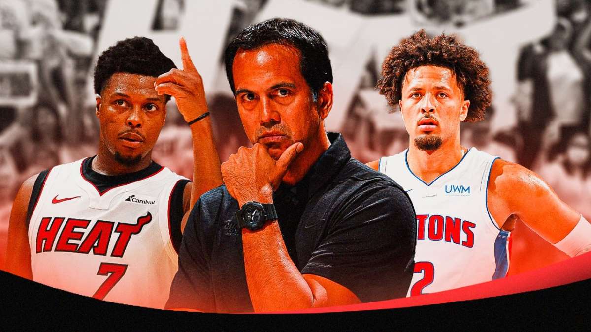 Miami Heat head coach Erik Spoelstra and guard Kyle Lowry with Detroit Pistons guard Cade Cunningham in front of the Kaseya Center.