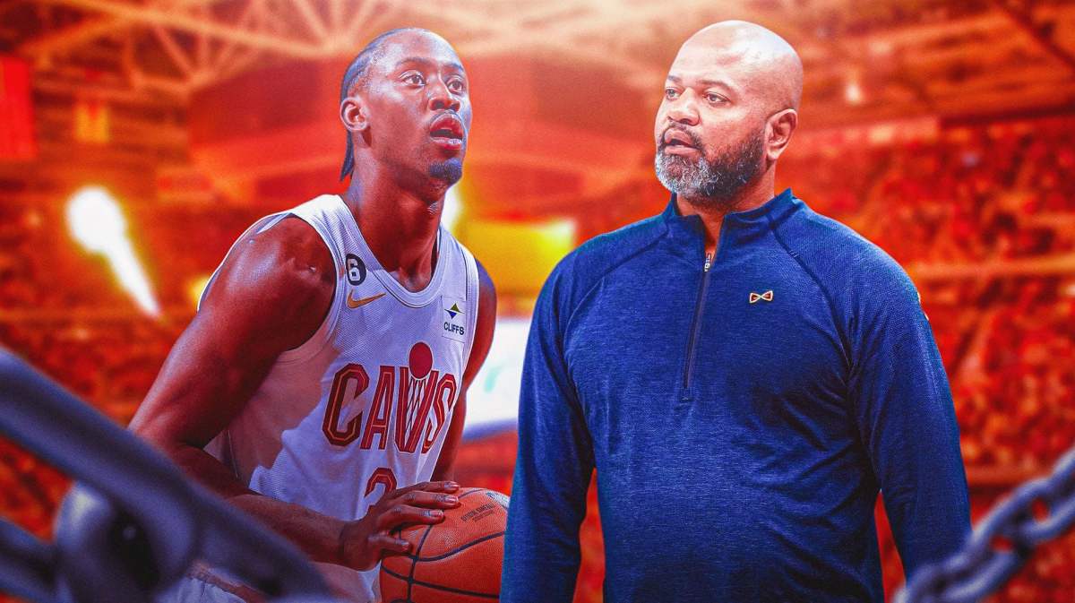 Cavs' Caris LeVert shooting a basketball. Cavs' JB Bickerstaff in front