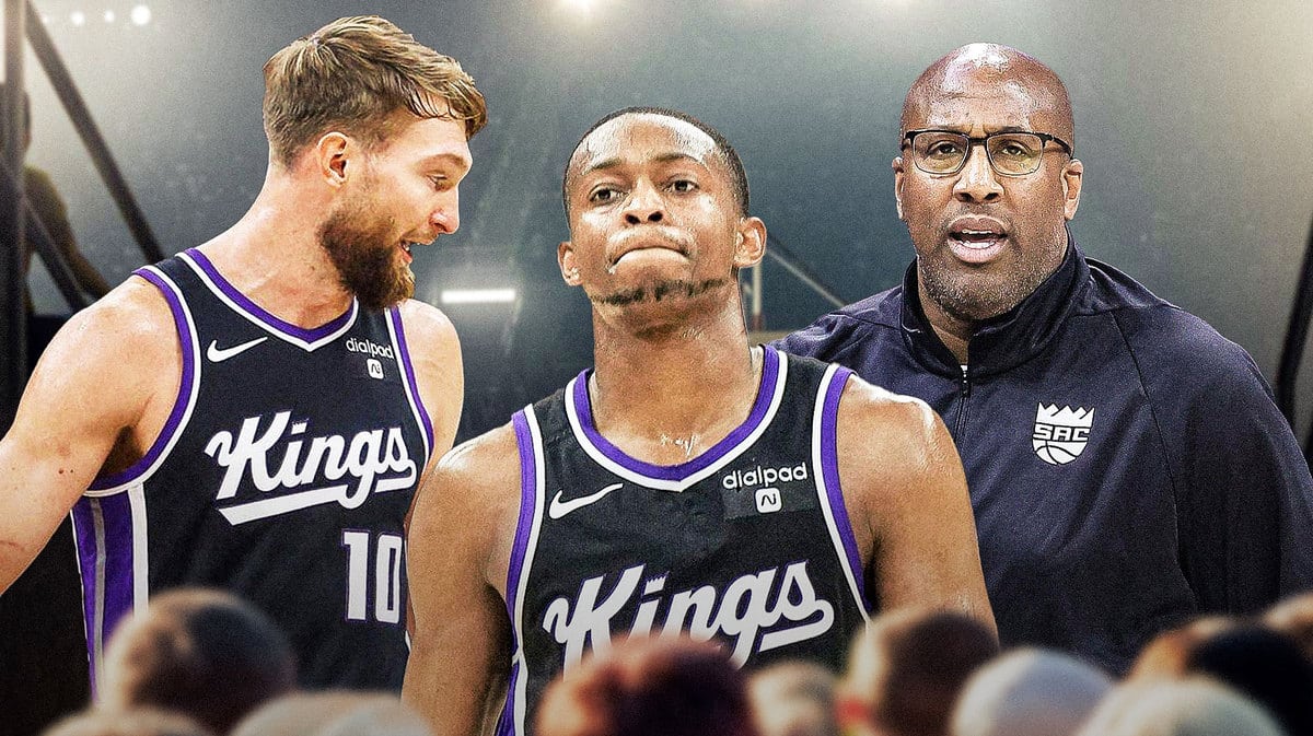 Kings' De’Aaron Fox looking disappointed/hurt, with Domantas Sabonis and Mike Brown looking concerned